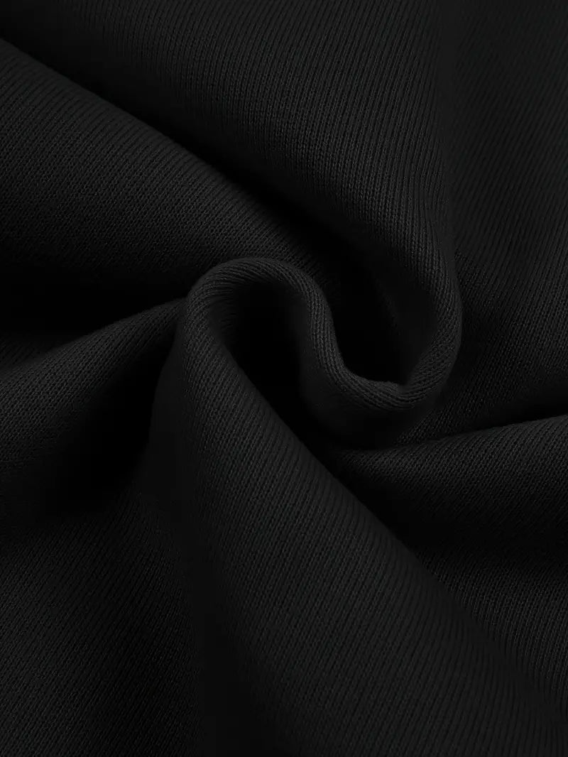Close-up of black fabric with folds
